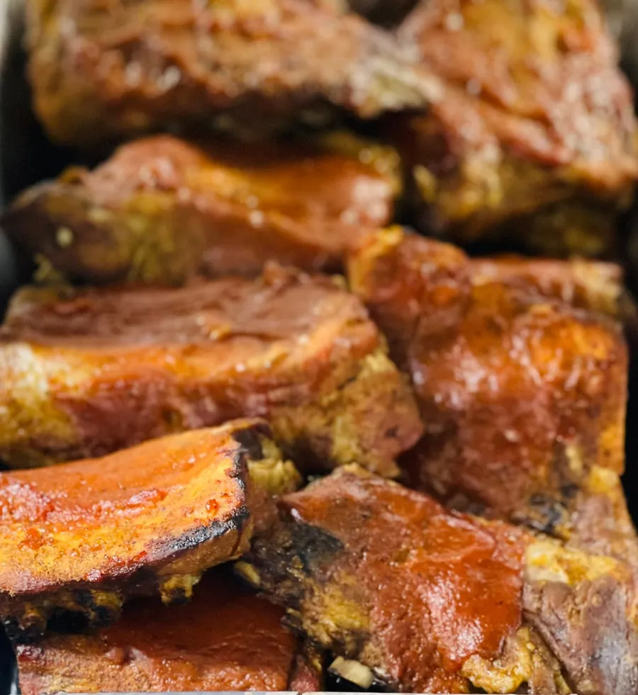 Saucy barbecue in a chafing pan, ready for the buffet line